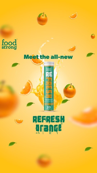 A vertical ad creative displaying an effervescent tablet tube surrounded by a refreshing orange splash and floating citrus fruit elements.